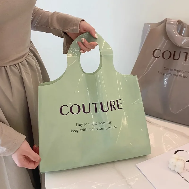 Explosive clothing store thickened plastic portable shopping bags clothes with gift packaging bag spot wholesale