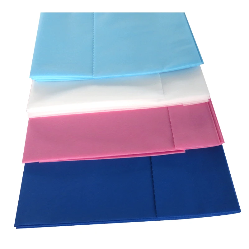 Fabric disposable nonwoven bed sheet roll