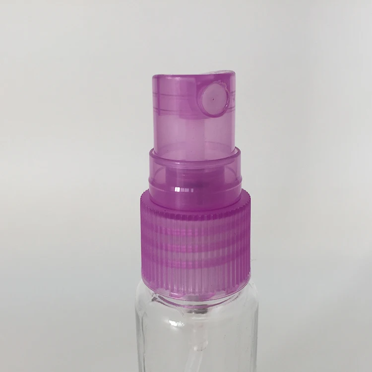 Wholesale 20ml transparent PET spray bottle with fine mist sprayer multi color lid for perfume dispenser, travel, outdoor