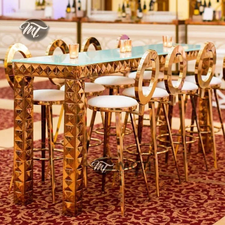 Modern gold wedding dining chairs and buffet tables with glass top