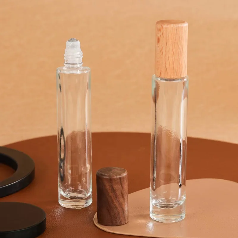 Clear glass essential oil roller bottles 10ml 15ml roller bottles for essential oils with wood cap