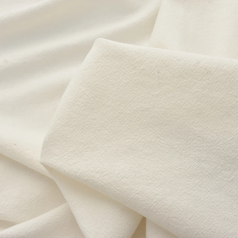 woven white fabric roll garment monks cloth fabric textured 100% cotton stone washed crinkle plain cotton fabric