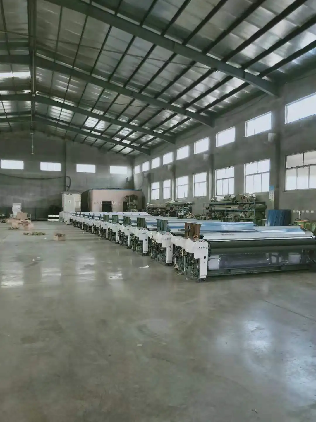 
QingDao DaPeng Double warp shaft high speed heavy water jet loom wholesalers 