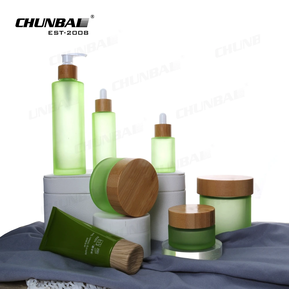 Фабрика по упаковке 6 унций 8 9 12 75 мл маленькие зеленые красивые бамбуковые пугвицы стеклянные банки с деревянной крышкой и крышками
