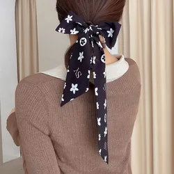 Thin and narrow strip tie women 2021 French retro hair scarf ins wind gentle and elegant hair band tie strap