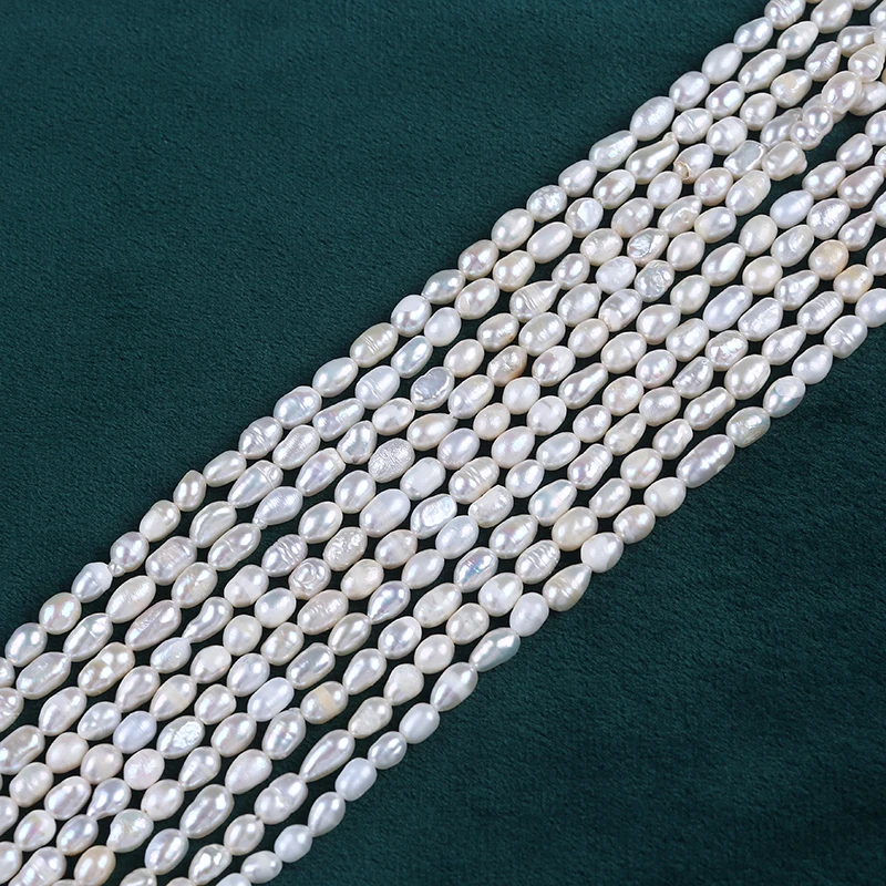 
4-5mm white rice shape freshwater pearl strands cheap beads 