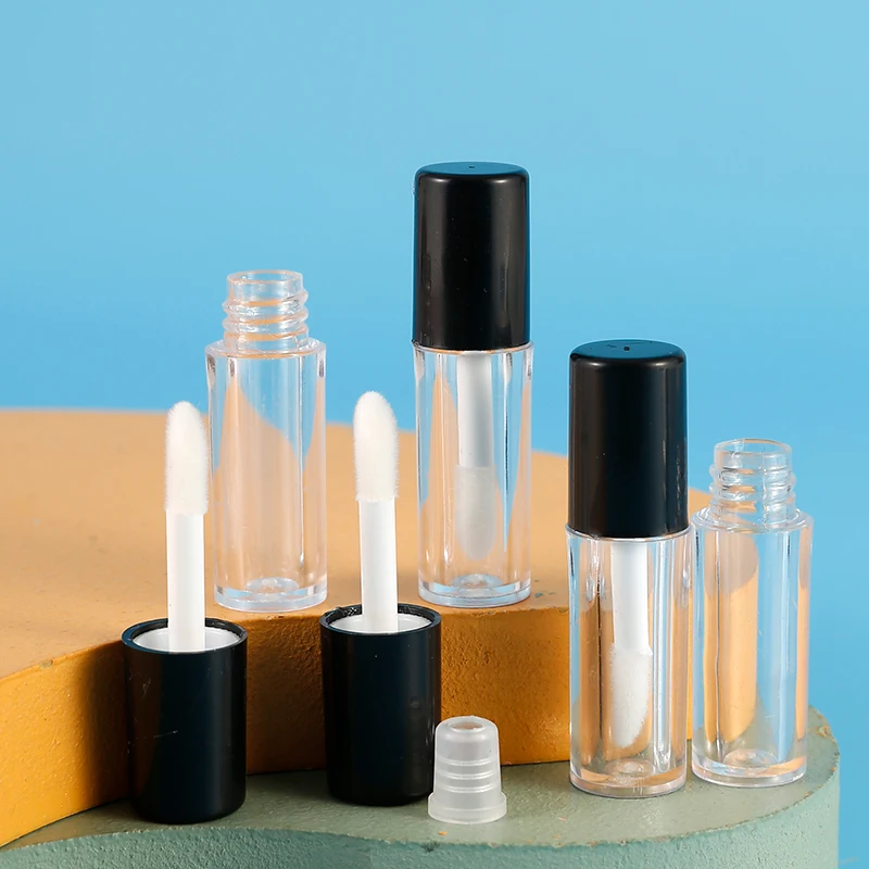 Round matte lip gloss tube transparent clear with black top , empty plastic cosmetic lip gloss tube small custom logo