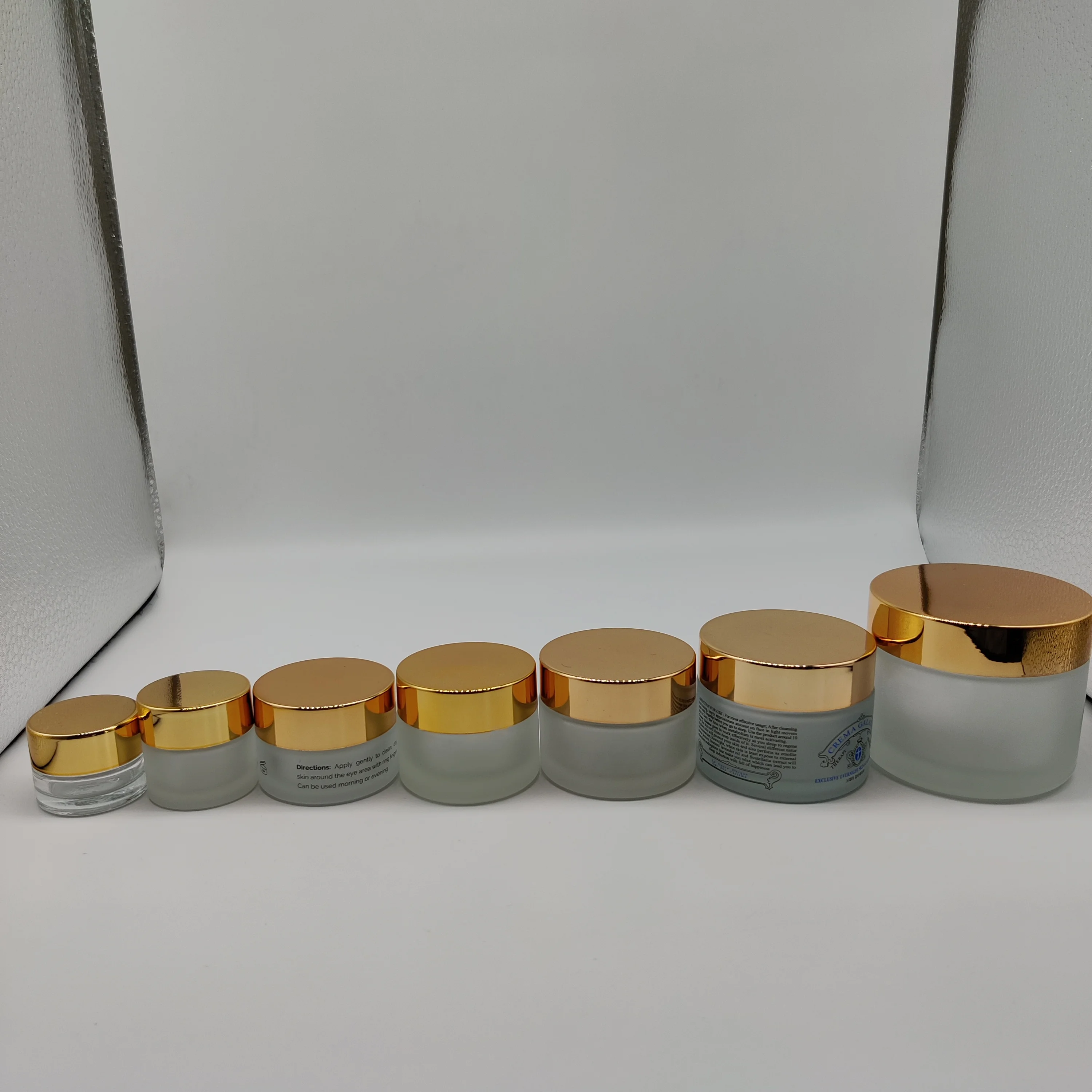 Factory hot sell cosmetic packaging 50ml frosted clear glass jar with bamboo lid