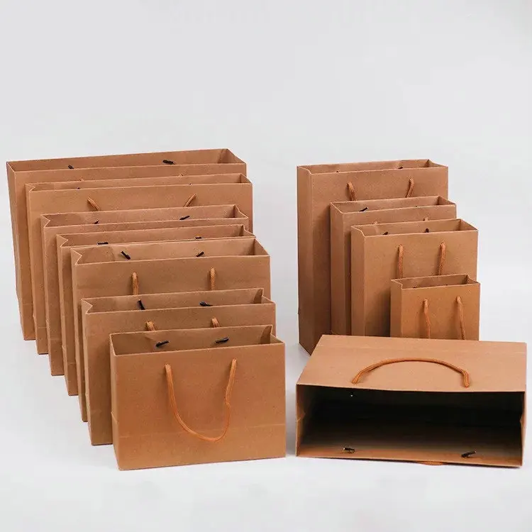 Wholesale Luxury Black Shoes Clothes New Gold Logo Hot Foiled Stamping Black Matt Kraft Paper Bag With Cotton Rope Handles