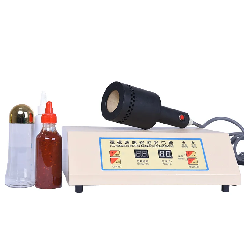 SF-1020 электромагнитный индукционный небольшой упаковочная машина для пластиковых труб машина для запечатывания фольги машина запечатывания