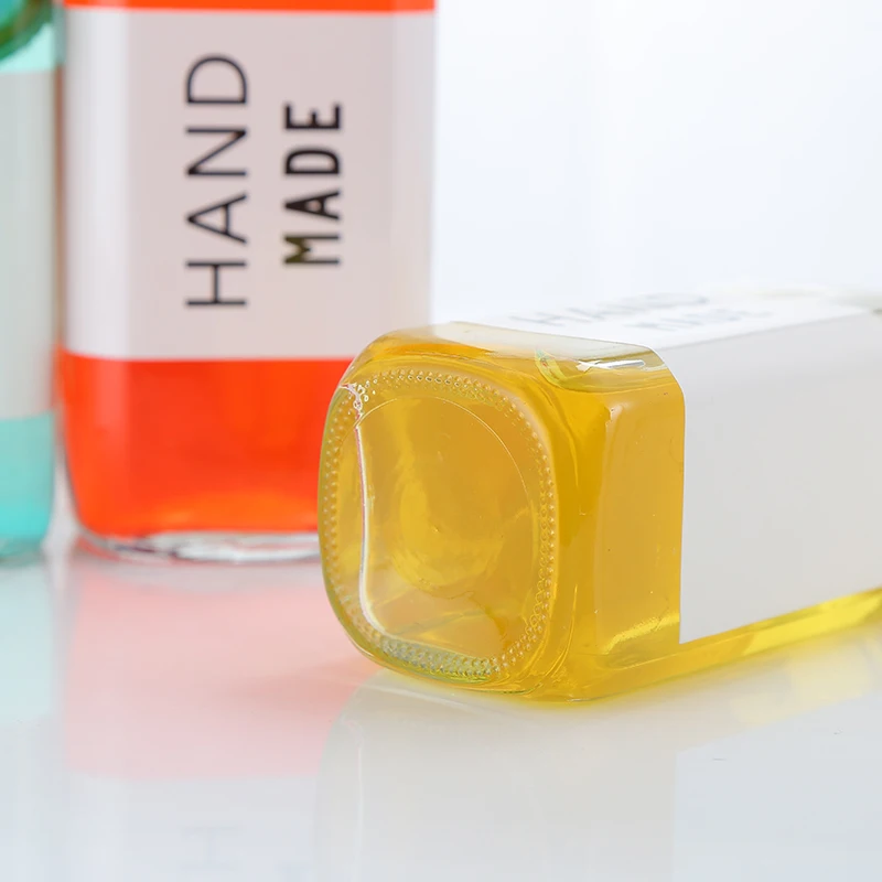 
Wholesale Recyclable Square 12Oz Juicing Glass Bottles Juice 16Oz Beverage Screw Cap Tea Packaging Glass Bottle Juice 250Ml 