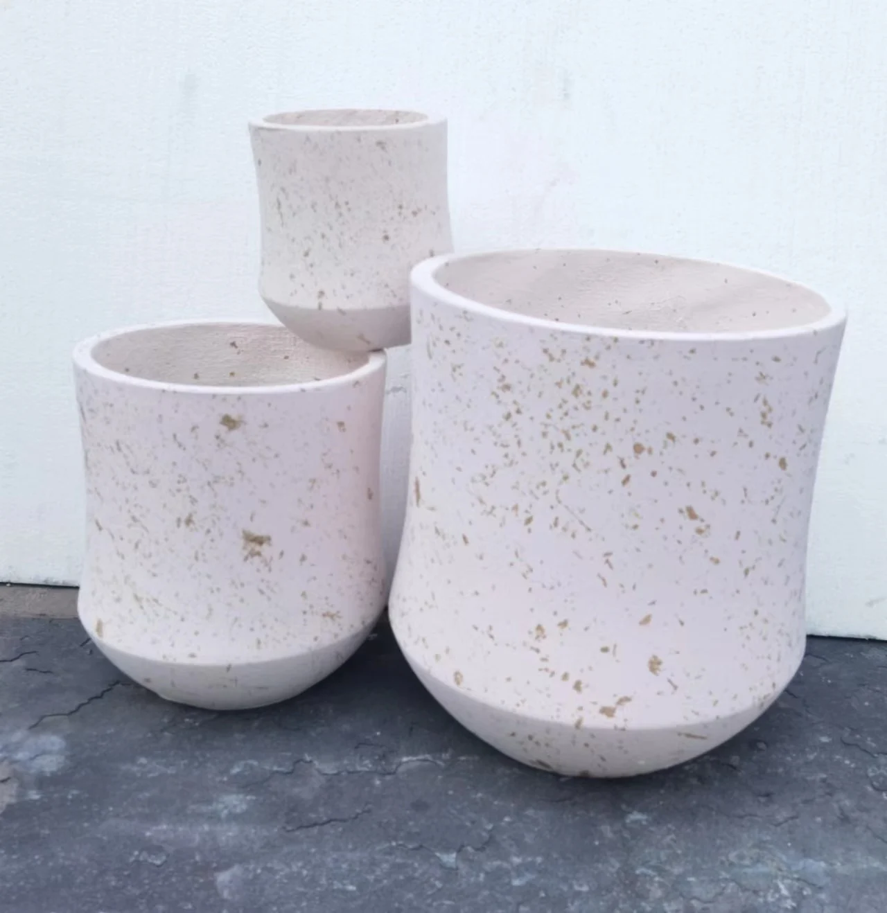 Marbled flower pots in various shapes for decorative