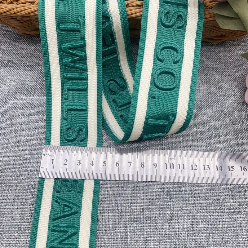 Comfortable Garment Customized Embossed 3D Logo Stripe Knitted Tapes Emboss Engrave Webbing for Sport Wear Pant Side