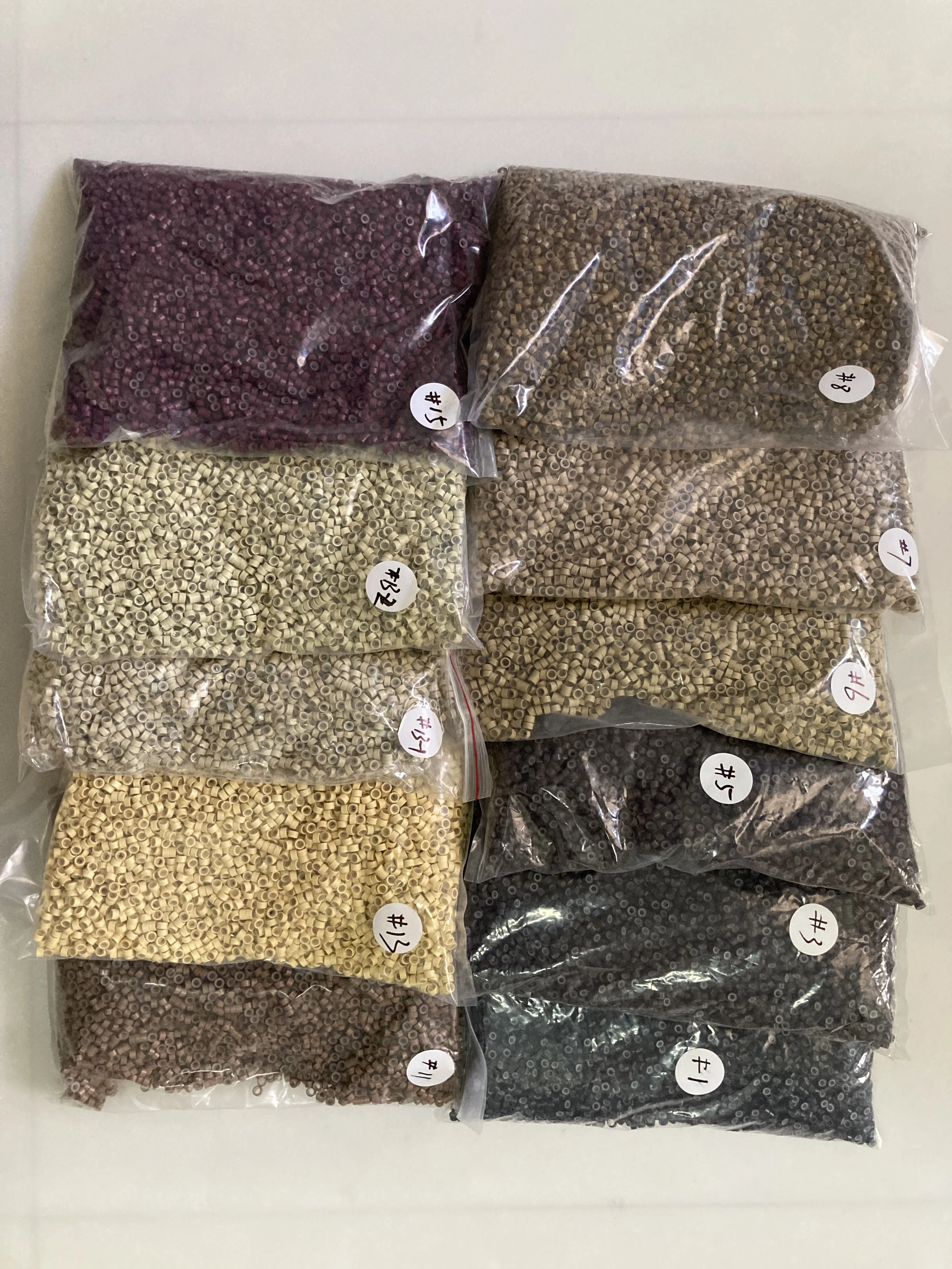 5mm metal hair extension silicone rings 10000pcs per bag  hair extension beads with silicone lined hair extension beads