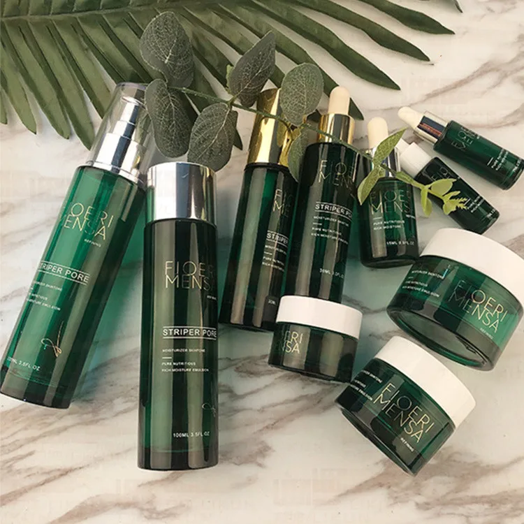 Оптовая продажа, высококачественные роскошные косметические бутылки и банки из зеленого стекла с серебряными крышками по хорошей цене