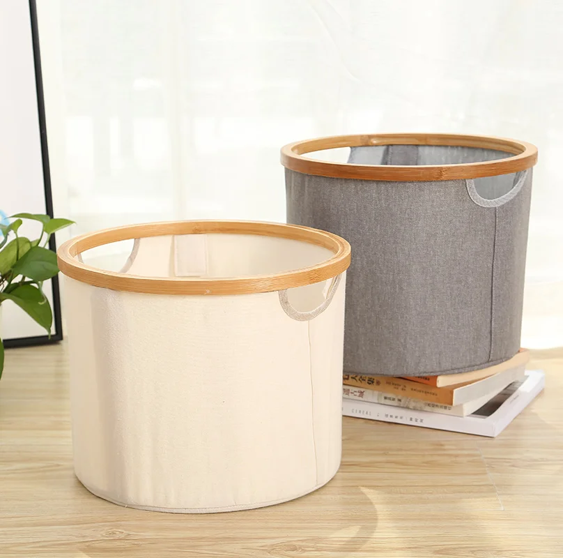 Cheap fashional wooden foldable dirty clothes laundry basketHot seller fabric foldable cloth laundry basket with bamboo