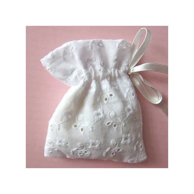 white cotton eyelet lace gift bag with ribbon
