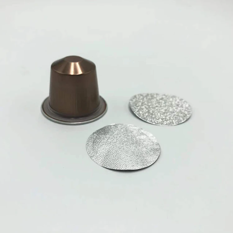 Nespresso cup coffee capsules and aluminum foil lids