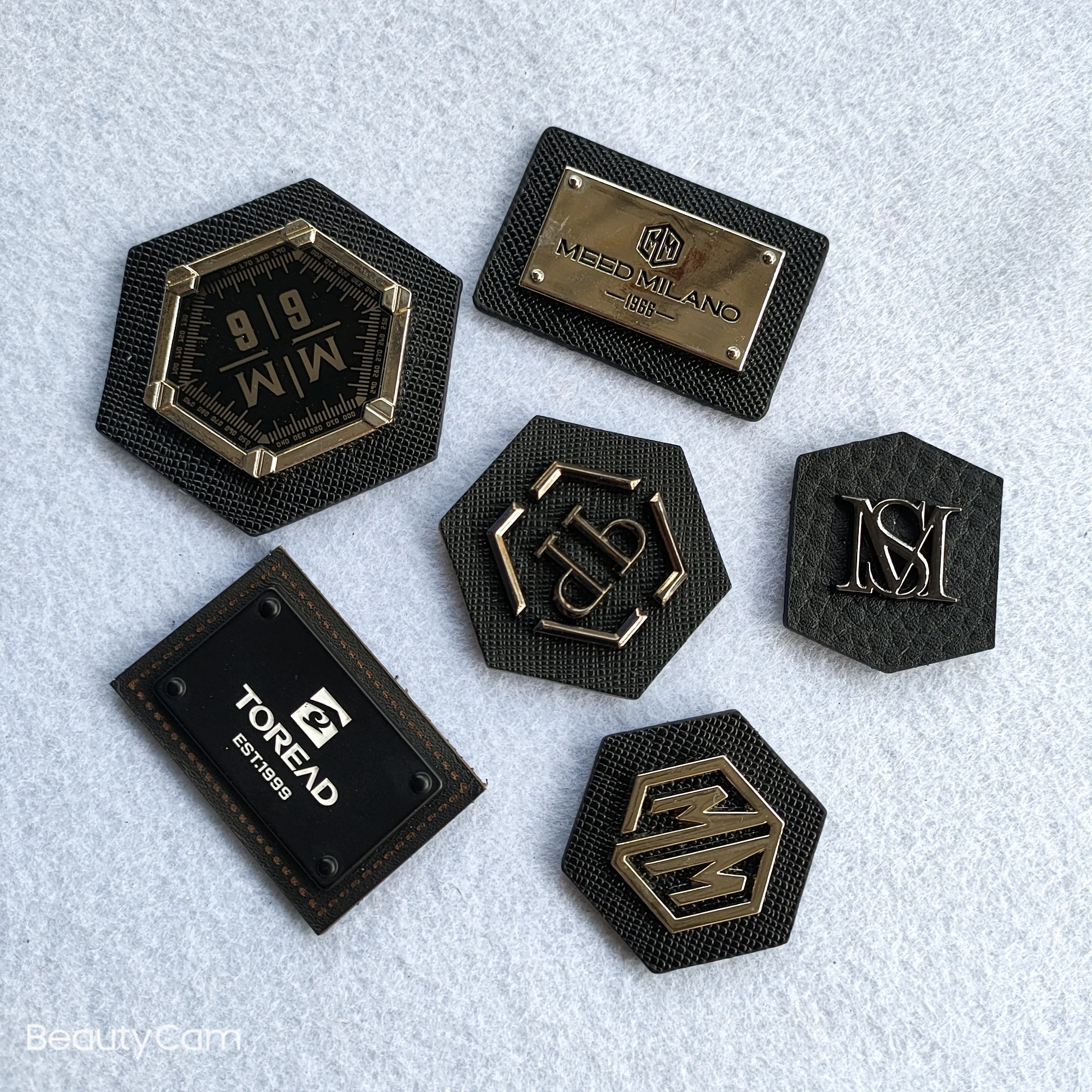 Custom fashion clothing accessories black PU leather metal logo sewing handbag metal label