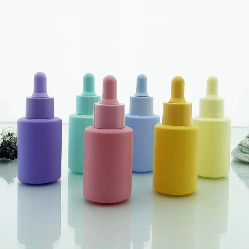 Frosted colorful wholesale cosmetic skincare packaging glass essential oil dropper bottles glass 30ml serum bottle