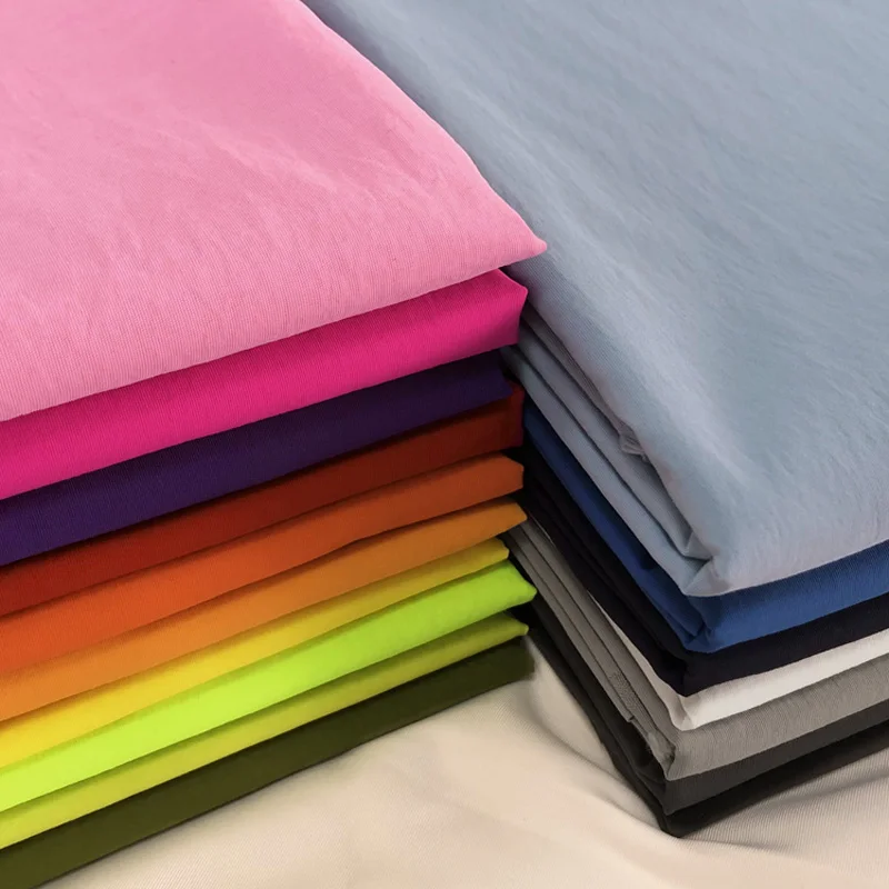 Water proof 228T RPET 100gsm recycled crinkle nylon taslan fabric for raincoat bag