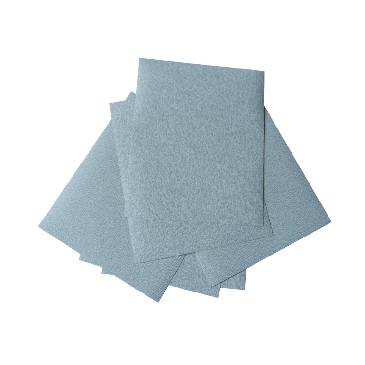 Grey rectangle sanding through drywall paper for dry polishing