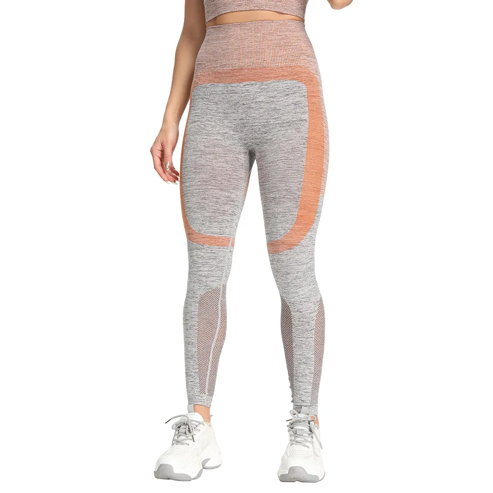 The hot - selling high waist sports and fitness leggings booty lifting AB yarn seamless hollow yoga pants