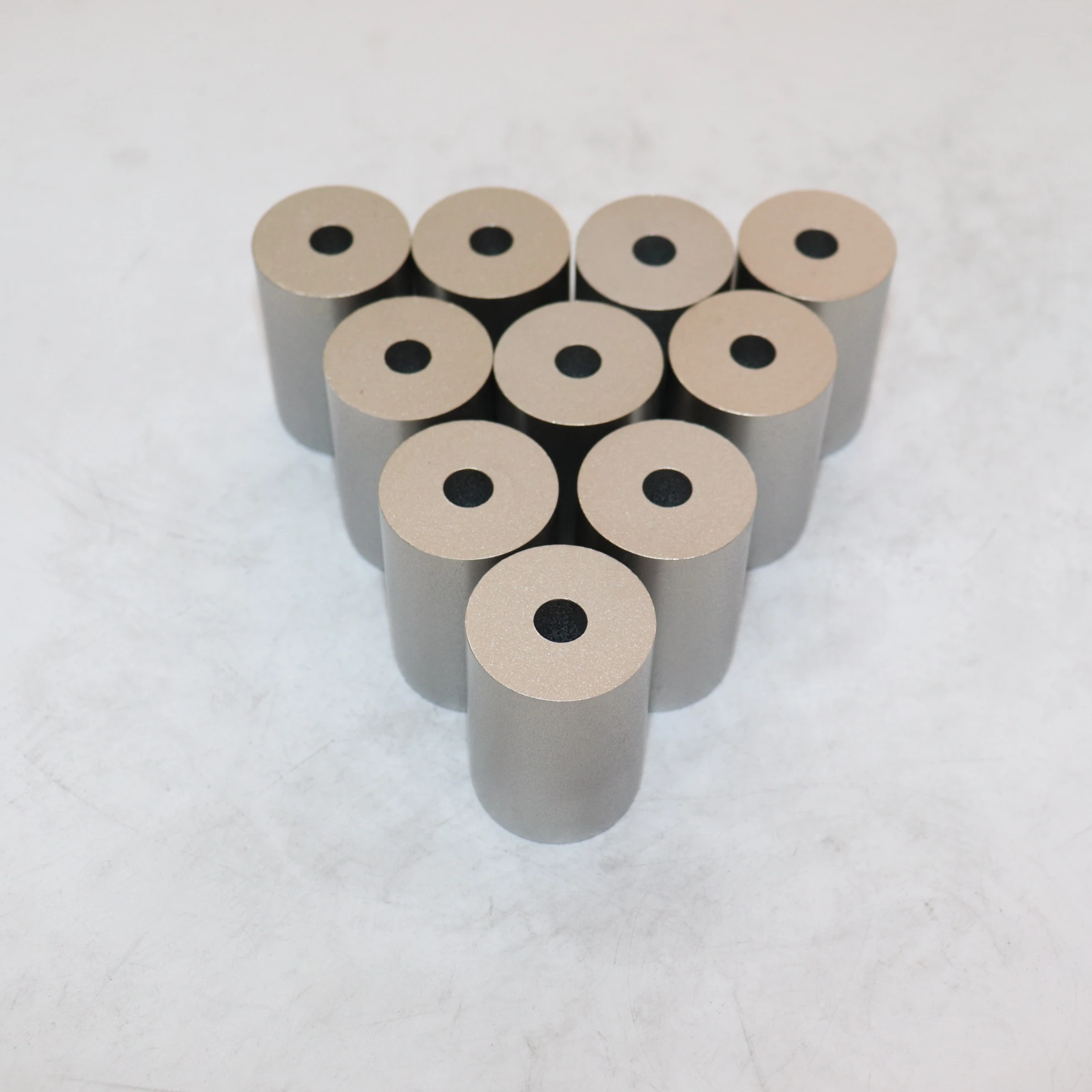 Tungsten carbide cold heading die used for punching fasteners. Such as bolts , nuts, nails, studs,ect.