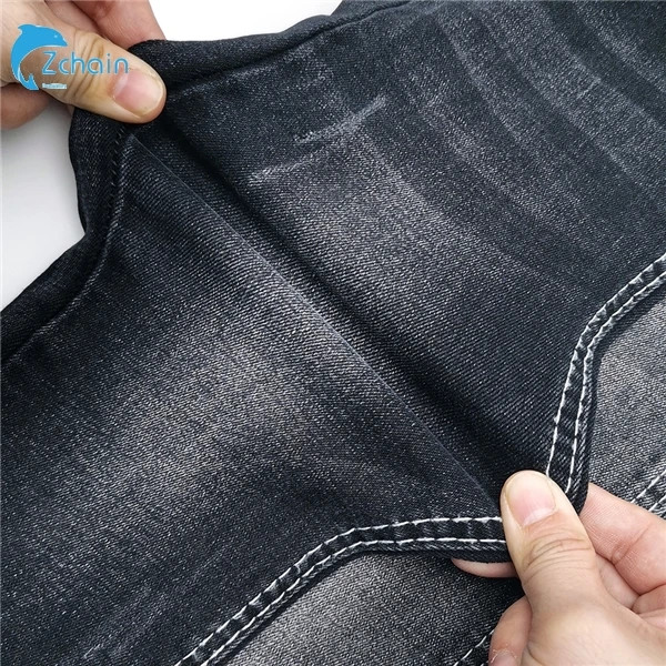 Cheapest twill stretch denim stock lot fabric pakistan denim jeans factory