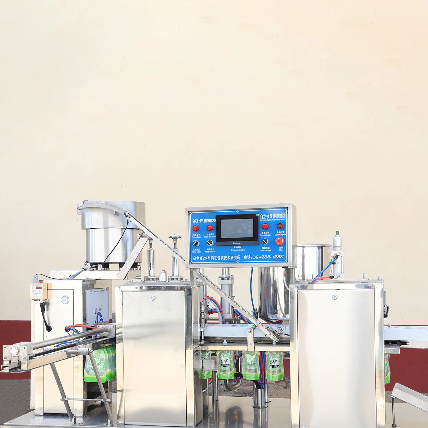 Full automatic 4 nozzle standing pouch juice soy milk plastic bag filling packaging machine factory juice filling equipment