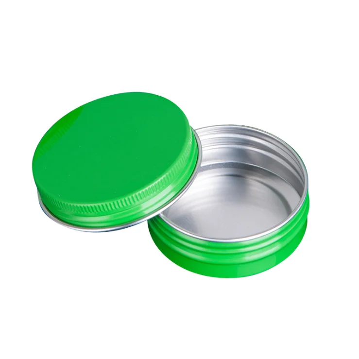 green aluminum tin jar.png