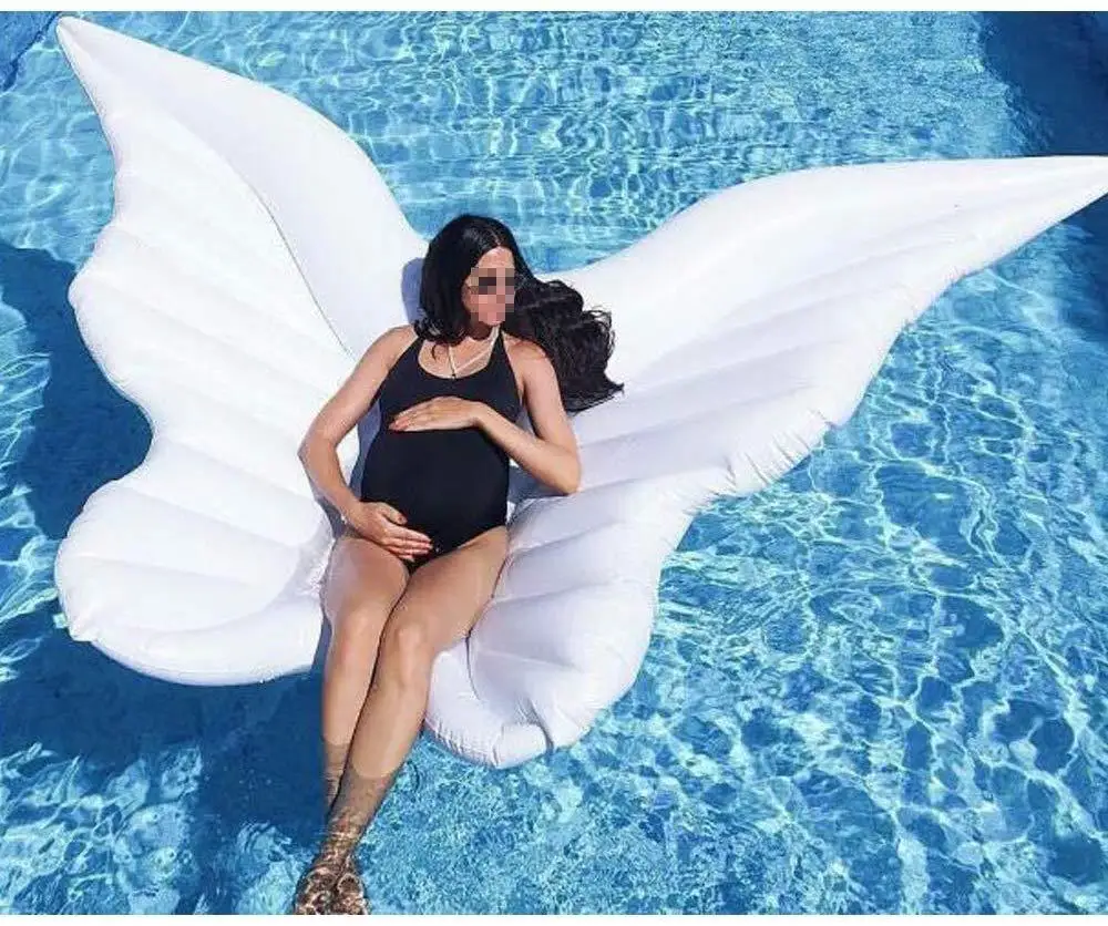 Inflatable butterfly wings floating on the floating bed angel wings playing in the water floating pad