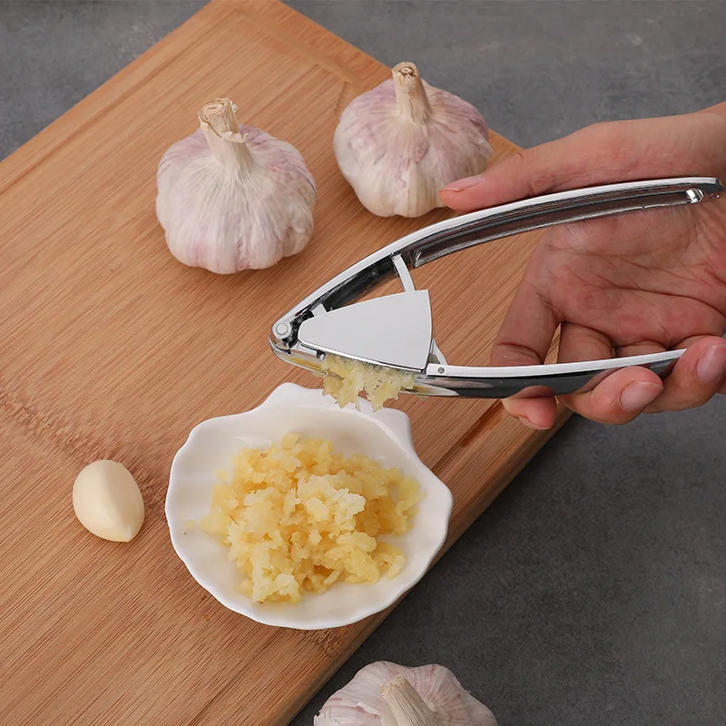Manual kitchen gadget Garlic Press meshed garlic device