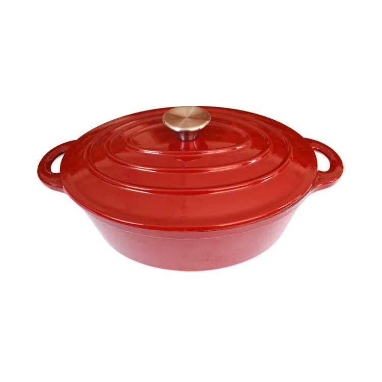 Enameled red oval cast iron dutch oven with two ears