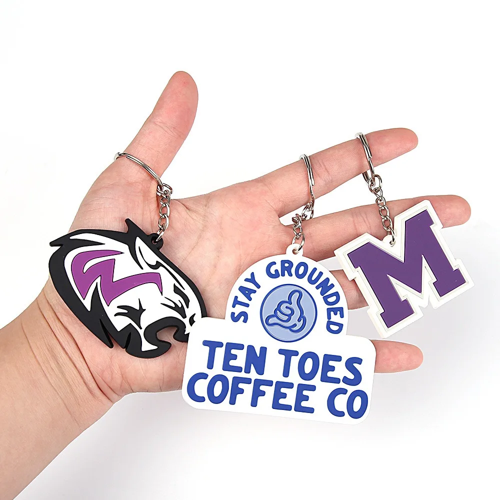 Personalized promotional soft pvc logo 2D rubber gift key chain custom logo letter keychain cute fashion key holder