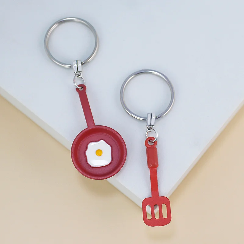 New stylish alloy keychain camera TV castle pot fried eggs Christmas tree bicycle pendant bag decorative car pendant gift