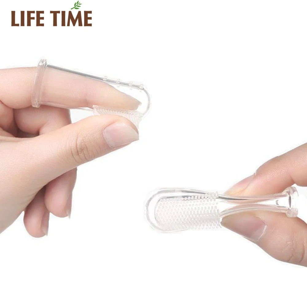 
silicone baby toothbrush baby thumb silicon oral clean toothbrush safety Food grade soft silicone baby finger toothbrush 