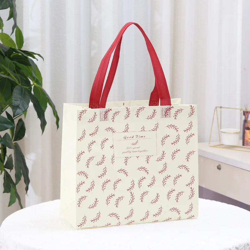 Three dimensional film covered non-woven bag color printing folding clothing store shopping bag cute birthday gift bag