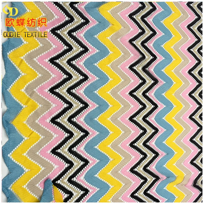 The manufacturer directly provides polyester yarn dyed blended polyester bright silk mesh knitted clothing fabric