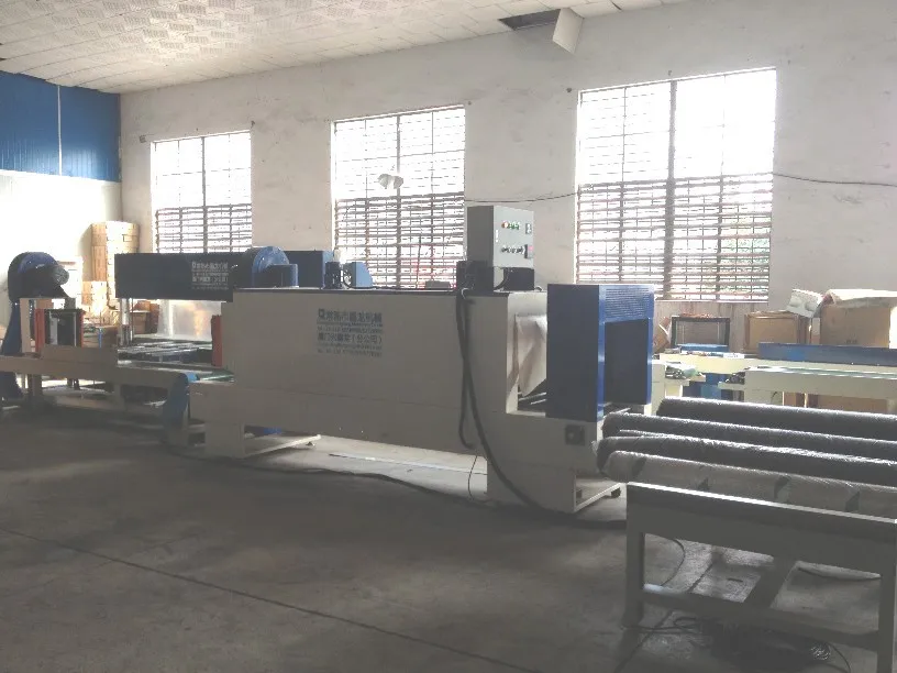 
Automatic Heat Shrink wrapper Machine to Pack Fabric Rolls By P.E. Film 