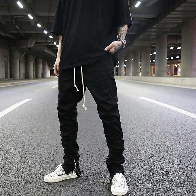 OEM fog trendy plain color draped stretch waist pants men stock slim fit ankle zipper jogger pants teen punk rap streetwear