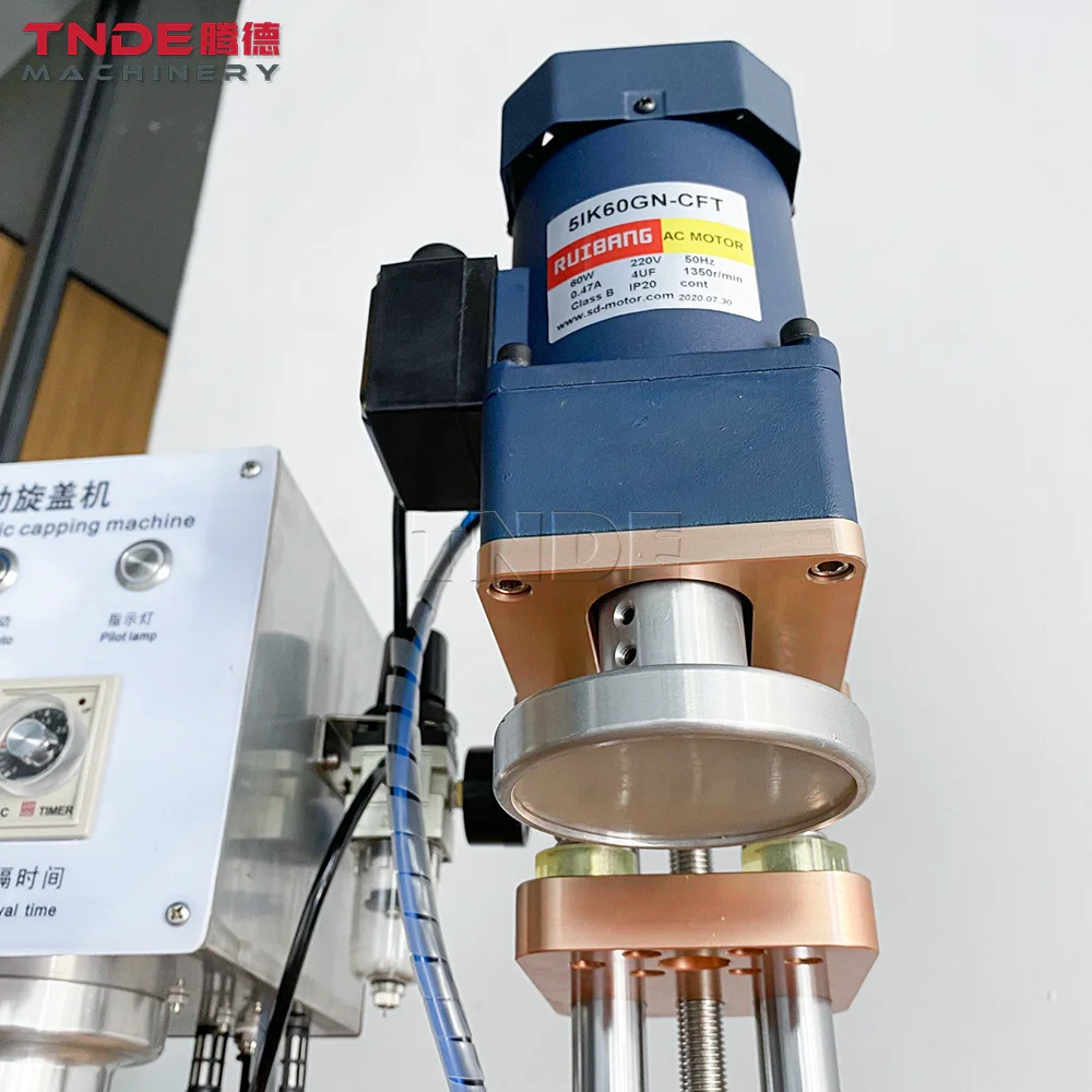 Guangzhou TNDTE Automatic Clamping Bottles Gass Jar Bottle Capping Machine Jam Ketchup Chilli Sauce Sealer