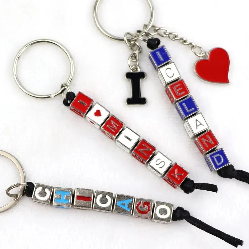 Factory price custom zinc alloy national letter long cube dice key chain