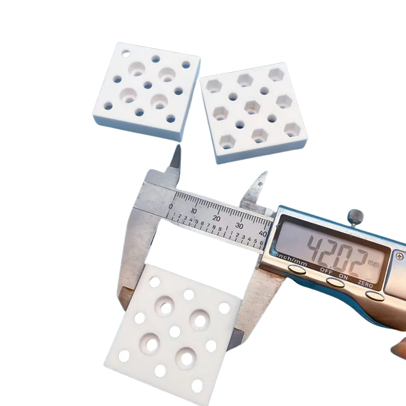 Custom machining of various precision ceramic parts ceramic nozzle screws of aluminum oxide zirconia and silicon nitride.