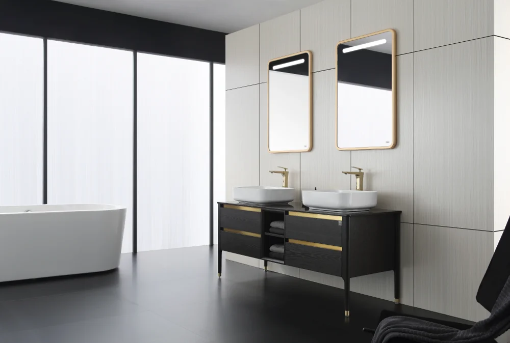 Double sink bathroom vanity with gold hardware