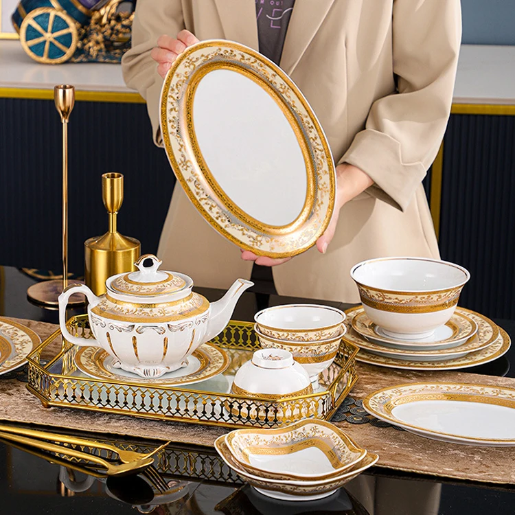 high-end tableware rice bowl oval shaped charger plate dinnerware sets luxury ceramic gold embossed