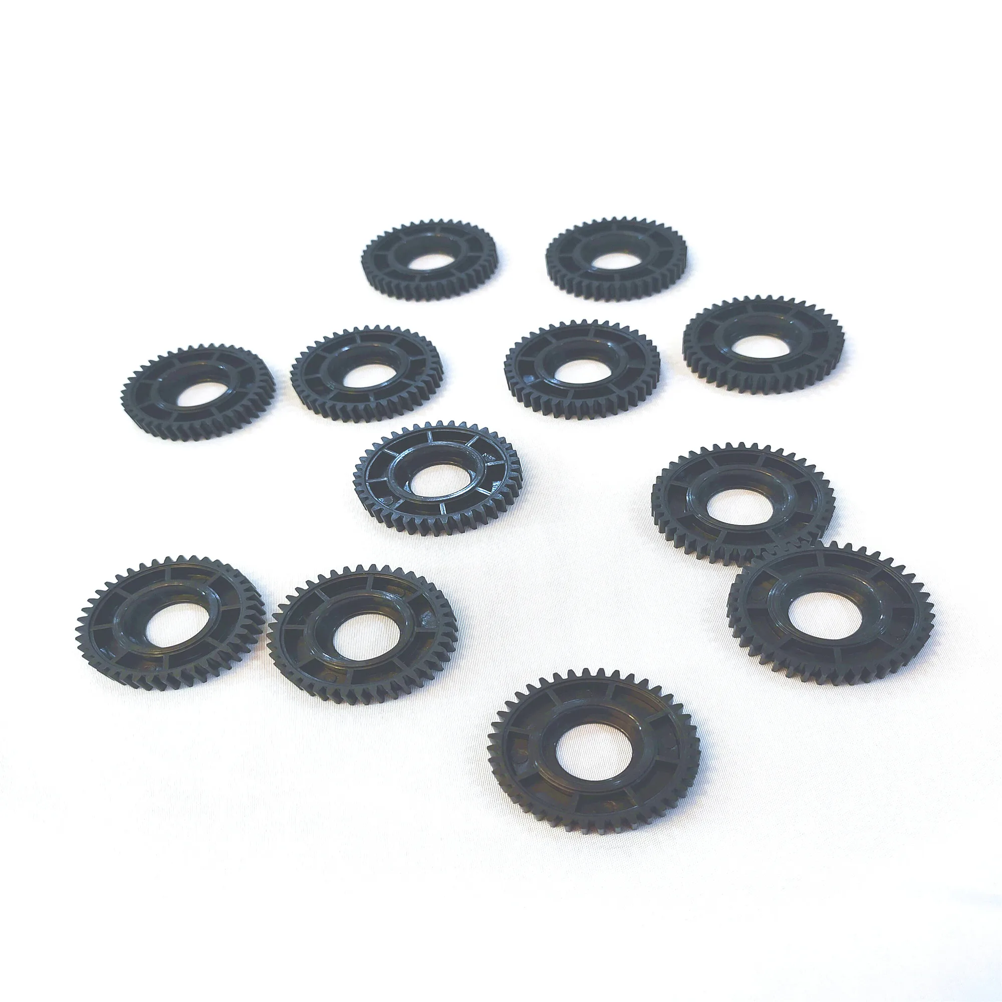 Пользовательские шестерни, спиральные шлифовальные пластиковые шестерни POM, высокоточные пластиковые шестерни