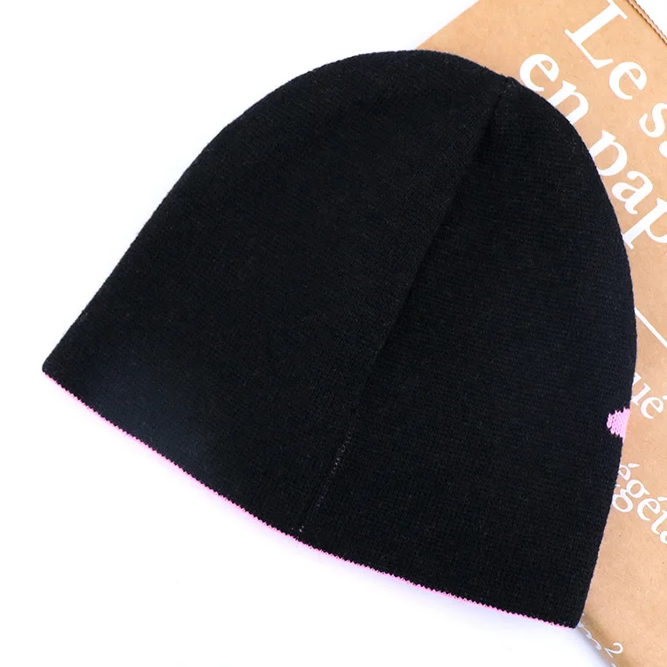 Qianzun manufacturers pink letter logo cuffless acrylic custom jacquard knit reversible beanie hat