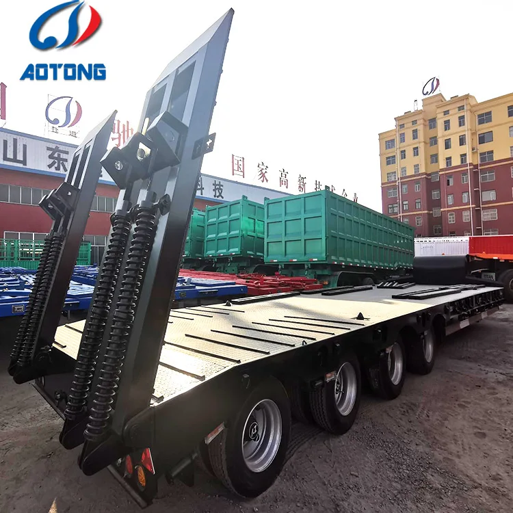 Сверхмощный полуприцеп Lowboy идеально подходит для безопасной транспортировки крупногабаритного оборудования техники и строительной