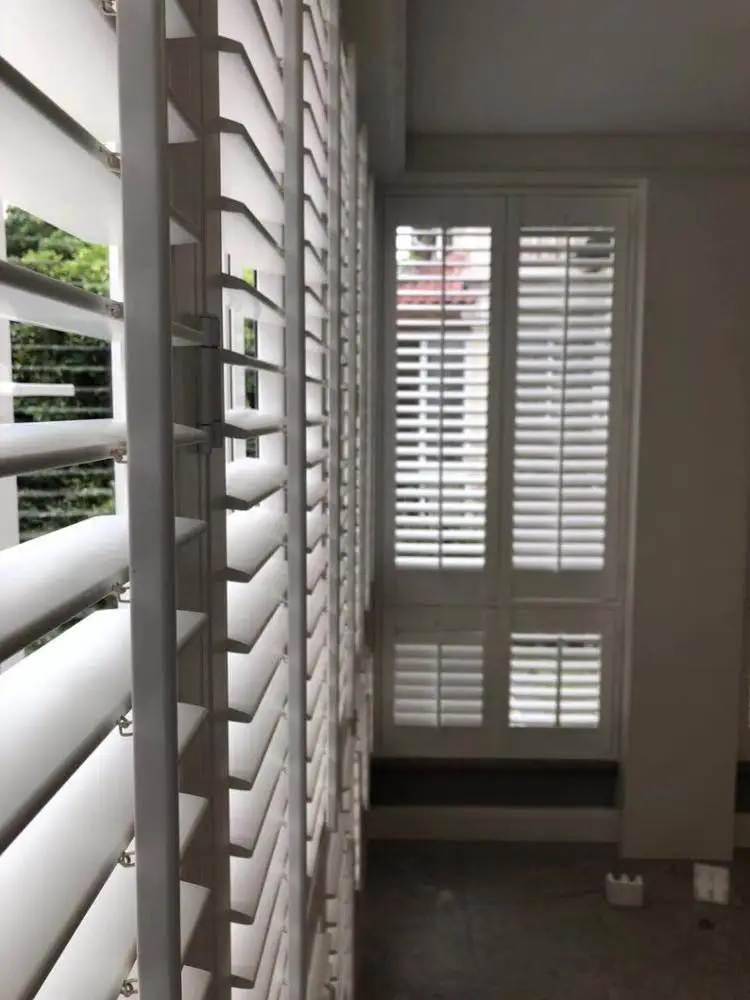 Basswood Composite 63.5 mm Plastic Door Plantation Shutter